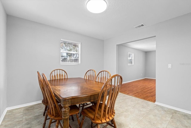 view of tiled dining space