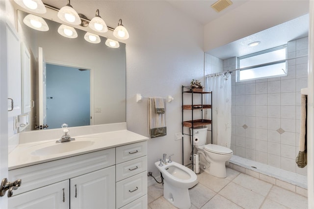 bathroom featuring walk in shower, vanity, tile patterned flooring, toilet, and a bidet