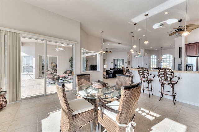 dining area featuring light tile patterned floors