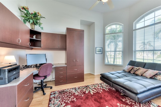 office area featuring light wood-type flooring and ceiling fan