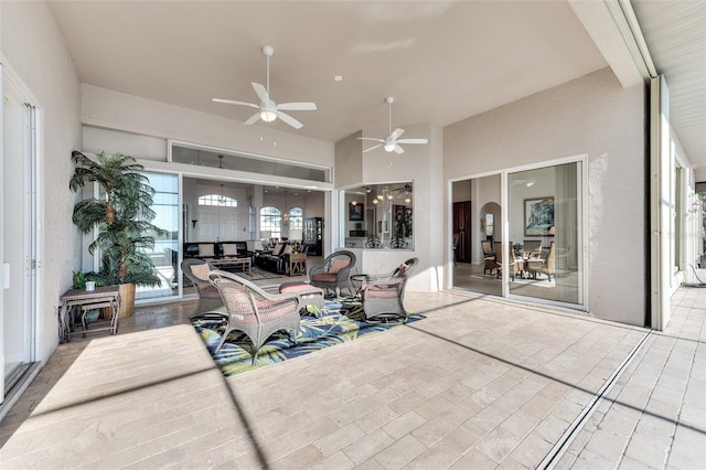 view of patio / terrace featuring ceiling fan and an outdoor hangout area