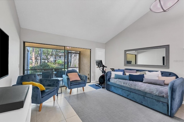 tiled living room featuring high vaulted ceiling