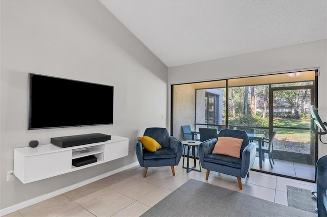 living room with lofted ceiling and light tile patterned floors