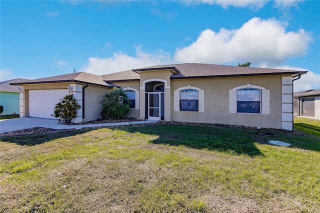 view of front of house with a front lawn and a garage