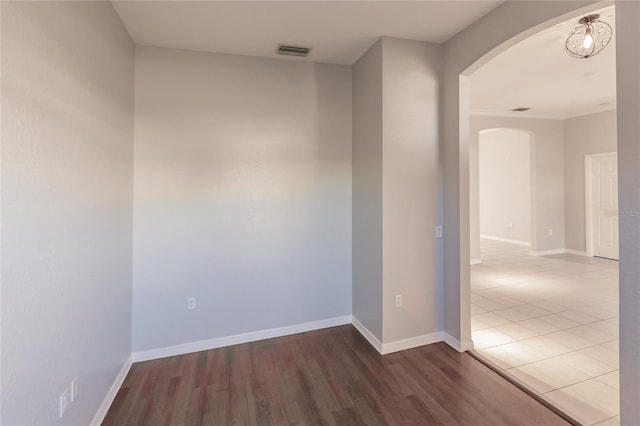 empty room featuring hardwood / wood-style flooring