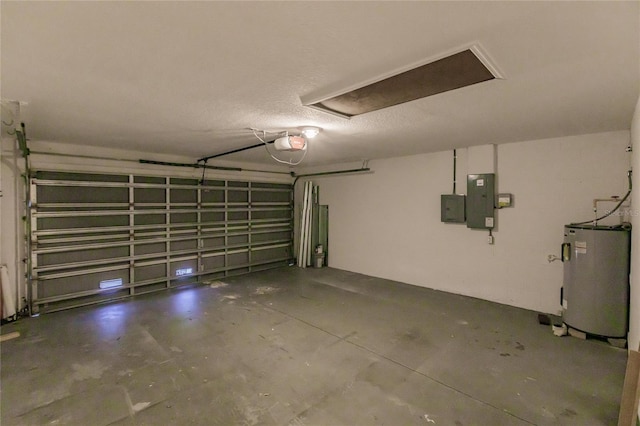 garage featuring electric panel, a garage door opener, and water heater