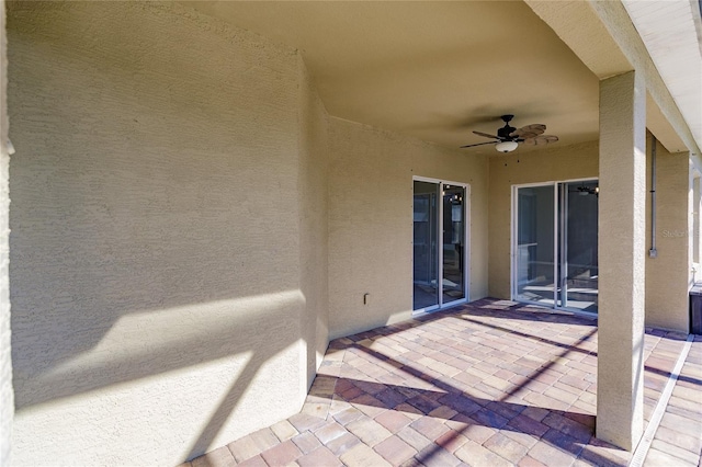 view of patio / terrace featuring ceiling fan