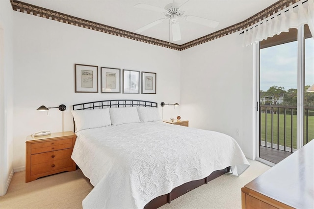 bedroom featuring access to exterior, ceiling fan, light colored carpet, and crown molding