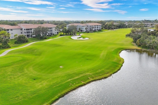 surrounding community with a water view