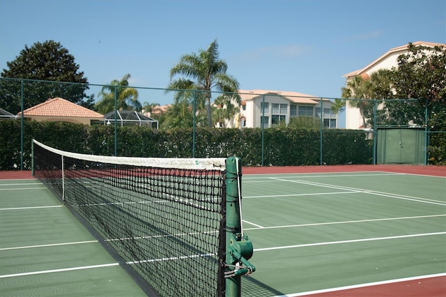 view of sport court featuring basketball hoop