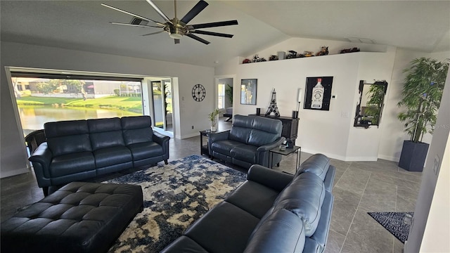 living room with lofted ceiling, a ceiling fan, and baseboards