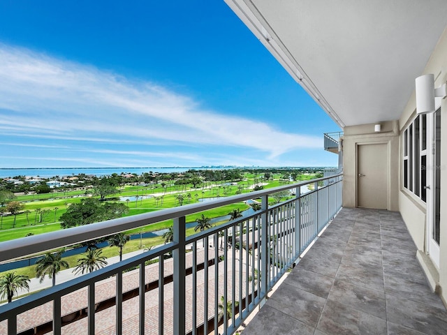 balcony featuring a water view