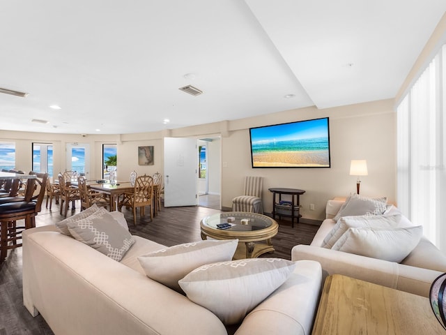 living room with dark hardwood / wood-style floors