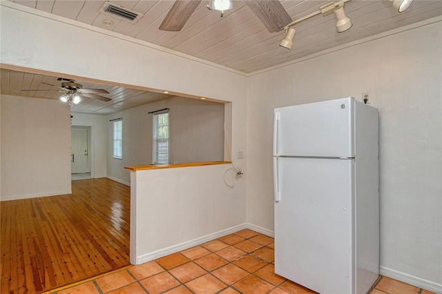 kitchen with white fridge, wooden ceiling, and ceiling fan