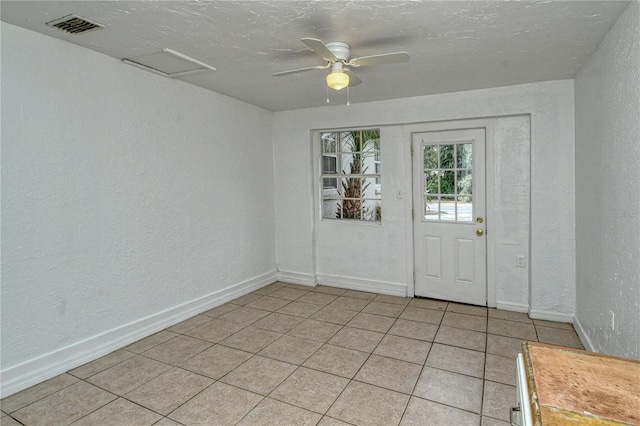 foyer with ceiling fan