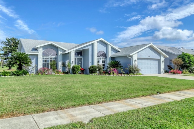 ranch-style house with a front lawn and a garage