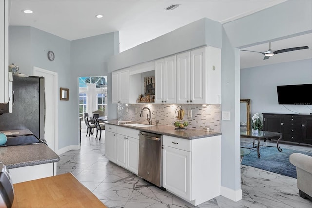 kitchen featuring sink, white cabinets, ceiling fan, and appliances with stainless steel finishes