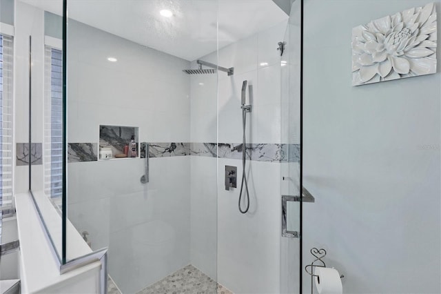 bathroom featuring tiled shower