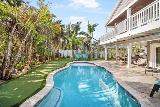 view of pool featuring a patio area