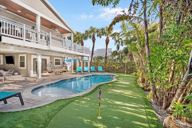 view of pool featuring a patio