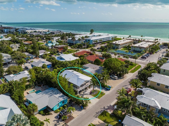 drone / aerial view with a view of the beach and a water view