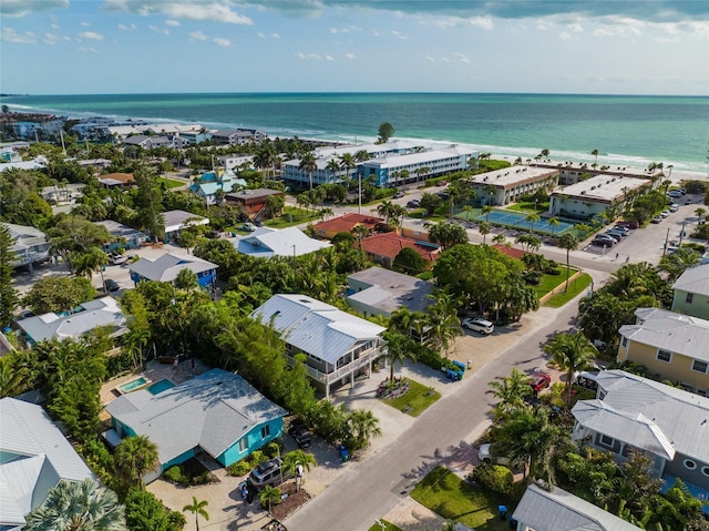 aerial view featuring a water view and a view of the beach