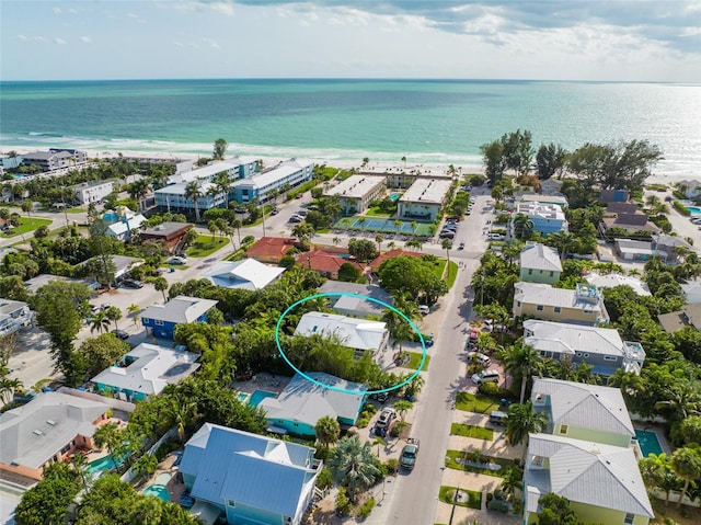 bird's eye view with a view of the beach and a water view