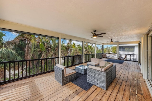 exterior space with ceiling fan and a wealth of natural light