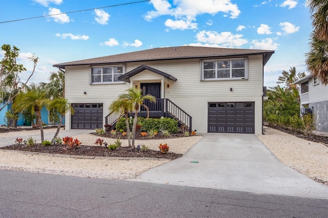 bi-level home featuring a garage