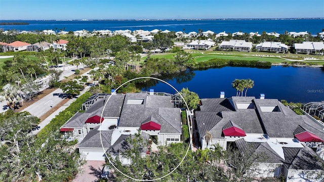 drone / aerial view with a water view