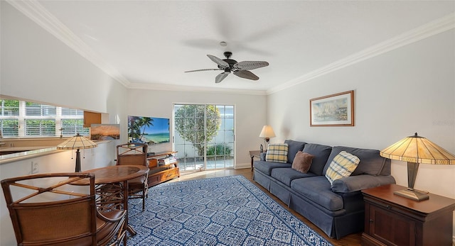 living room featuring ceiling fan, crown molding, and hardwood / wood-style floors