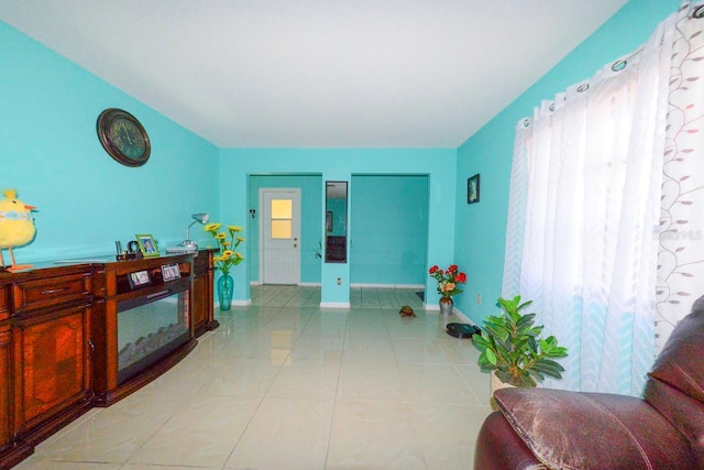 living room with light tile patterned floors