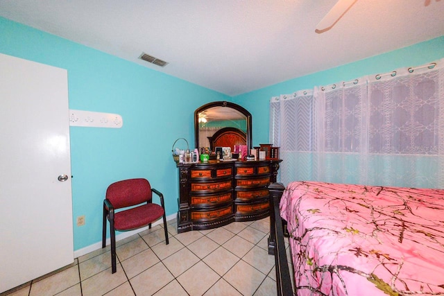 bedroom featuring tile patterned flooring and ceiling fan