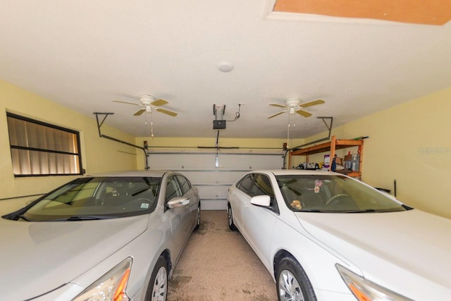 garage with ceiling fan and a garage door opener