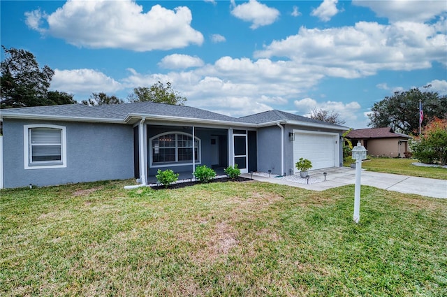 single story home featuring a front lawn and a garage