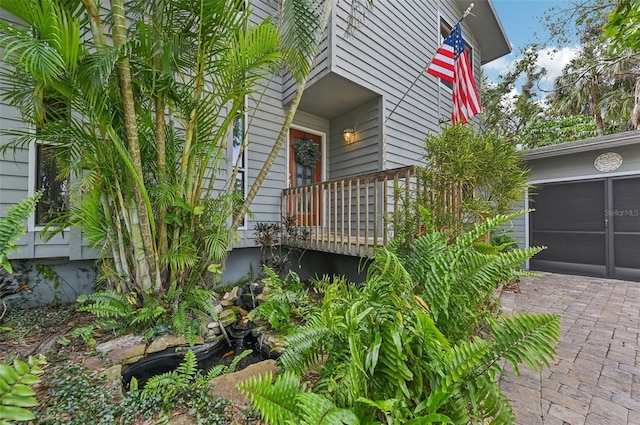 view of side of property featuring a garage