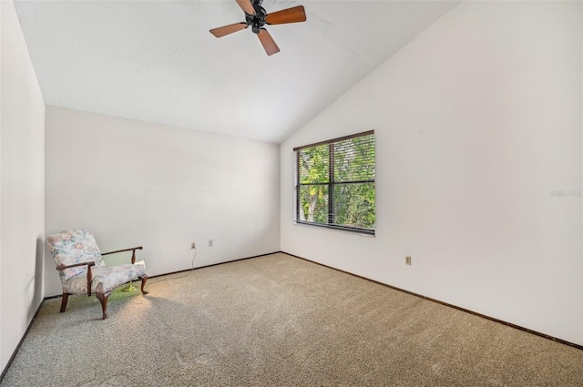 unfurnished room featuring vaulted ceiling, ceiling fan, and carpet floors