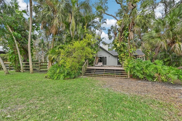 view of yard with a deck