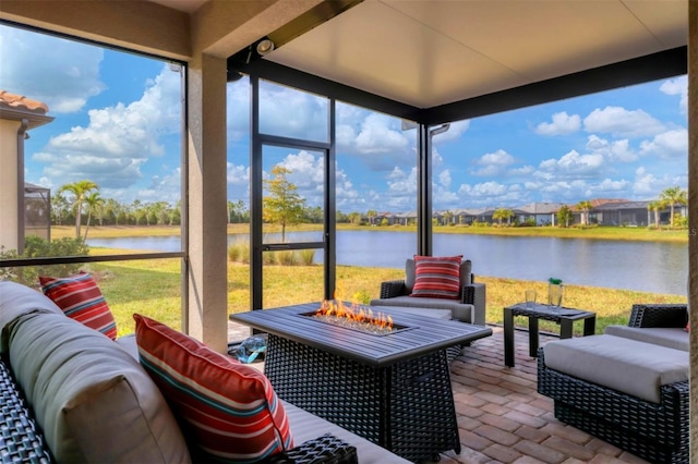 sunroom with a water view