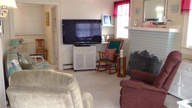 living room featuring carpet flooring, a fireplace, and a baseboard radiator