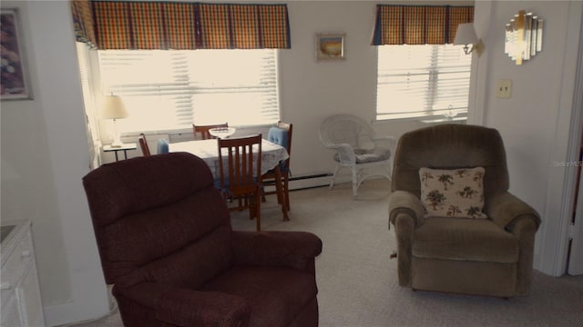 living area featuring carpet