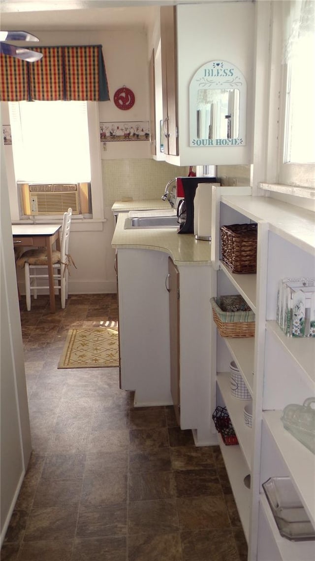 bathroom featuring sink and cooling unit