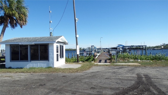 exterior space with a water view