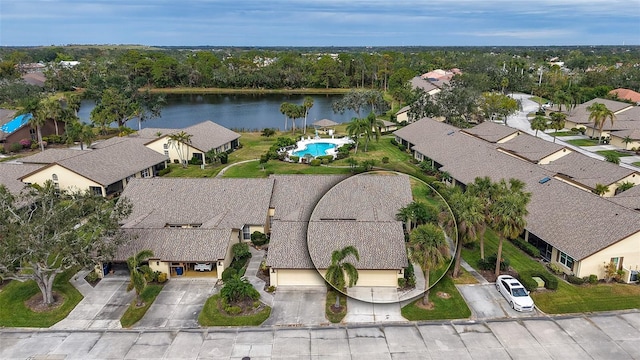 bird's eye view with a water view