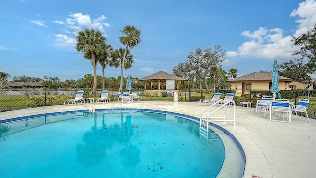 view of pool featuring a gazebo and a patio area