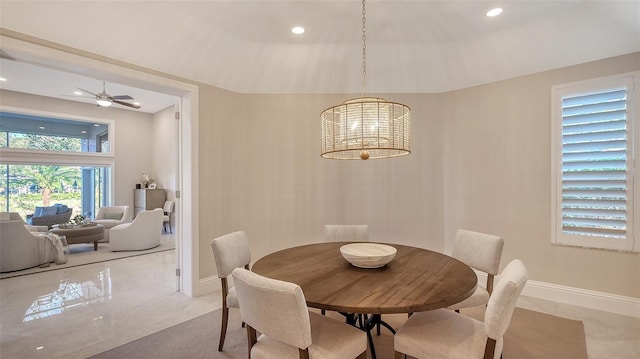 dining space with ceiling fan