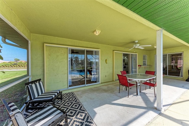 view of patio / terrace featuring ceiling fan