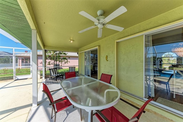 sunroom / solarium with ceiling fan