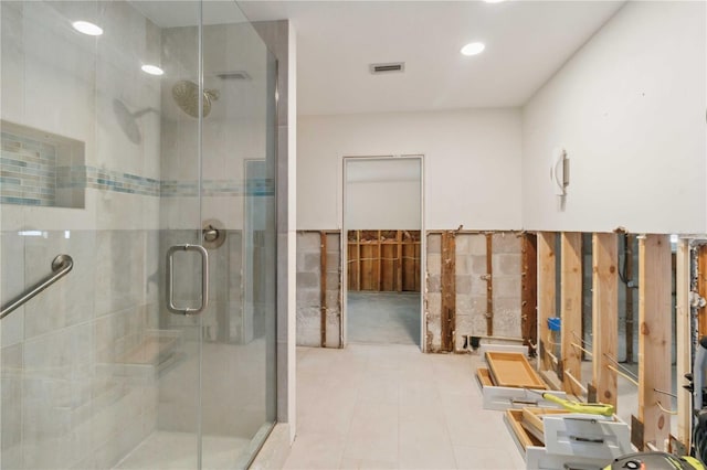 bathroom featuring an enclosed shower