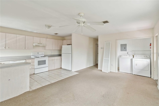 kitchen featuring washing machine and clothes dryer, white appliances, light colored carpet, electric panel, and ceiling fan